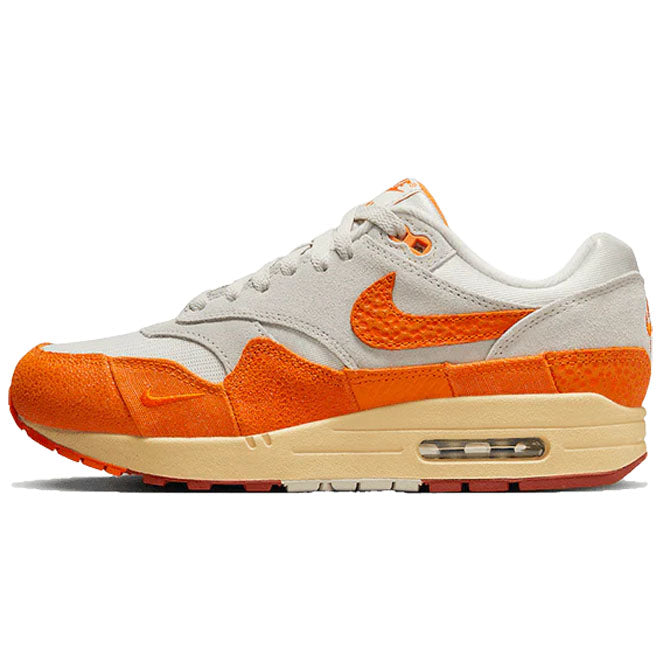 Nike Air Max 1 Magma Orange front view witte sneaker met magma oranje mudguard