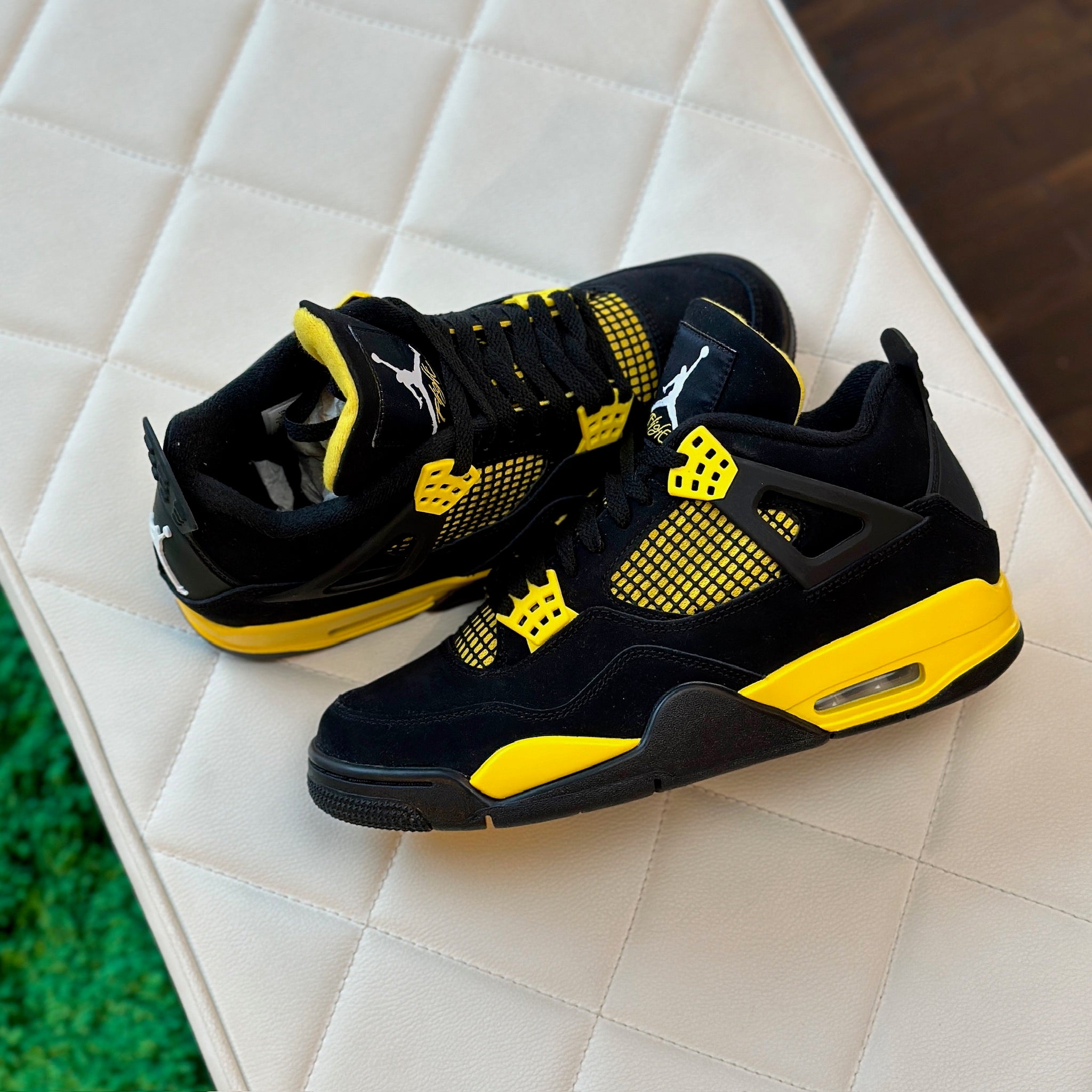 Air Jordan 4 Retro Thunder instore view available at HypedPair sneaker store