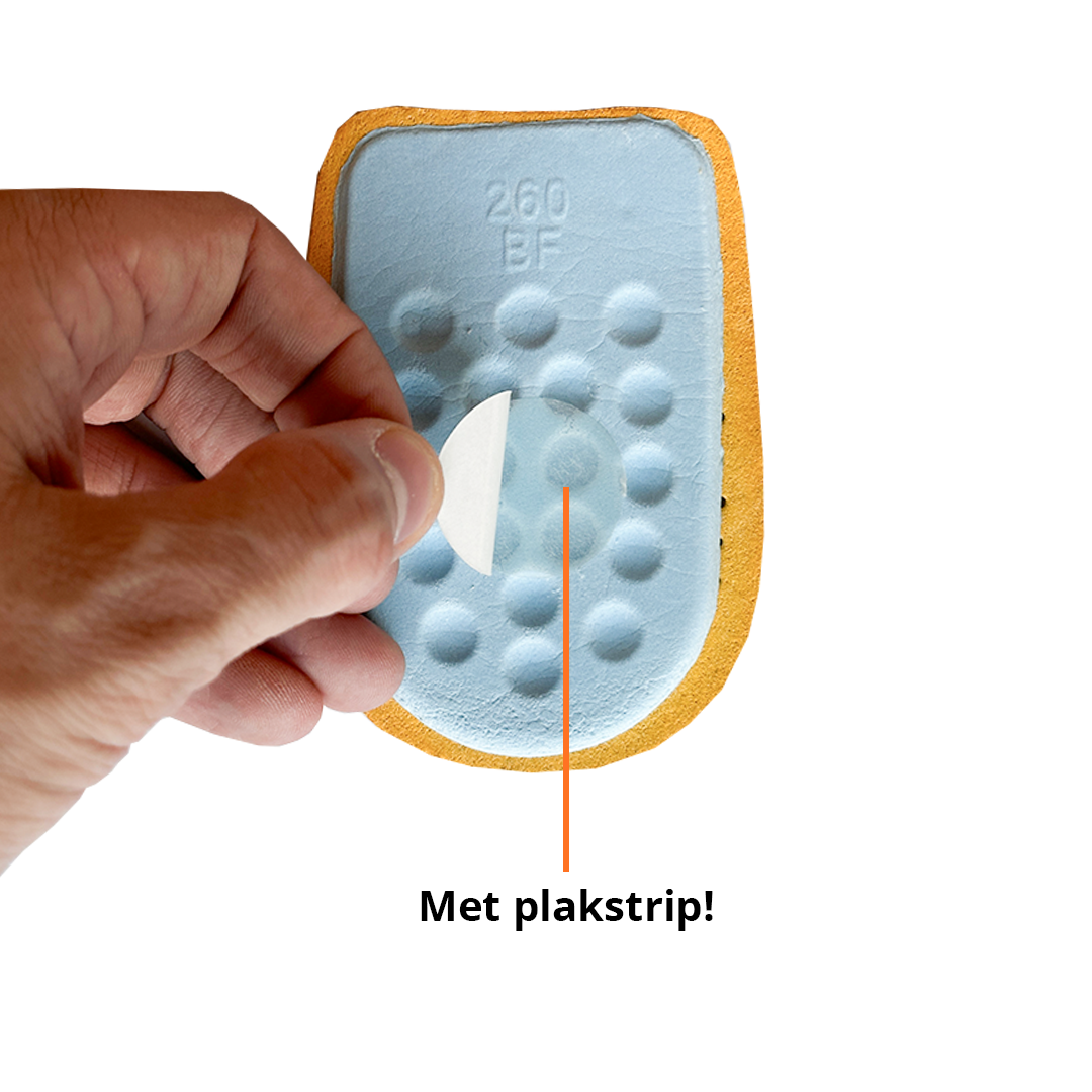Leren hakverhoger 1 cm met plakstrip zichtbaar front view bevestiging detail
