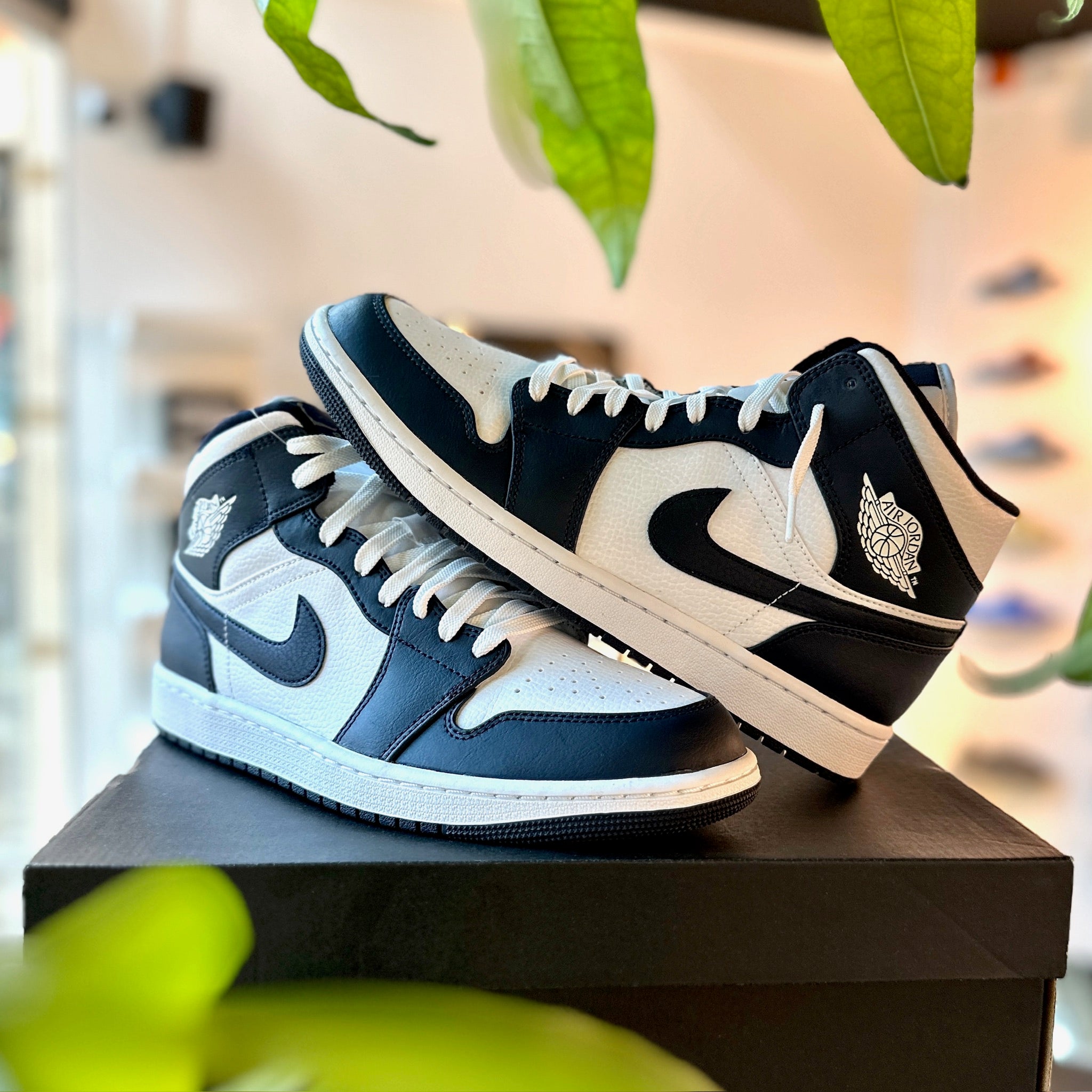 Air Jordan 1 Mid White Metallic Gold Obsidian sneaker in-store real life
