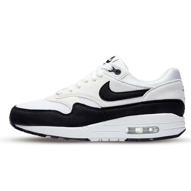 Nike Air Max 1 White Black Neutral Grey zijkant met suede overlays en zichtbare Air unit